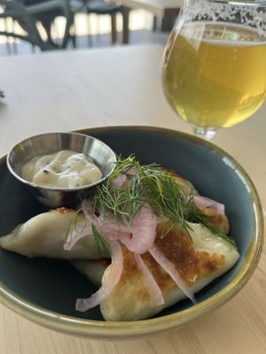 Delicious cheese & dill perogies 😋  at Connector Brewing in Westbank