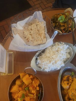 Roti, basmati rice, aloo gobi, and bhindi at Clay Pit in Austin