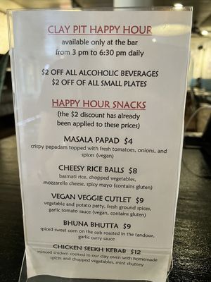 Happy hour menu  at Clay Pit in Austin