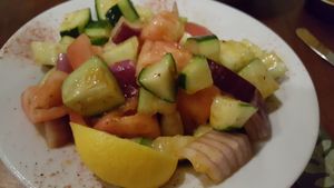 Cucumber tomato salad at Clay Pit in Austin