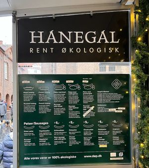 Menu board at Den Okologiske Polsemand - Food Stall in Copenhagen