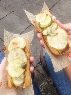 Roasted hot dog with vegan toppings at Den Okologiske Polsemand - Food Stall in Copenhagen