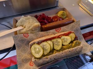 vegan tofu hot dogs: in a bun and with mashed potatoes at Den Okologiske Polsemand - Food Stall in Copenhagen