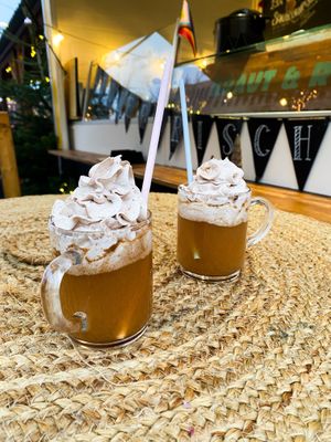 Sanddornpunsch (alkoholfrei) mit veganer Zimtsahne  at Kraut & Rueben in Kiel