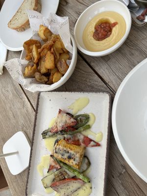 Side- grilled vegetables and fries- fava bean dip   at Luaz in Naoussa