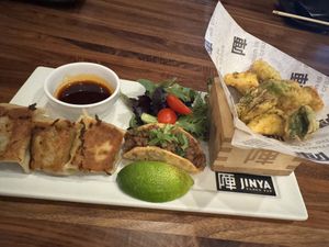 Tapas Platter - (3) Impossible Gyoza, (1) Impossible Taco, Tempura Brussel Sprouts  at JINYA Ramen Bar in Oklahoma City
