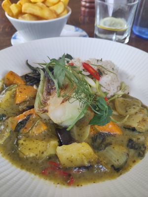 Close up of Thai green curry (vg means vegan on the menu) at The Grosvenor Arms in Chester