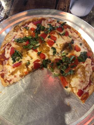 Gluten free crust (vegan) with vegan cheese, roasted red pepper, basil, and sauteed onions. at Mellow Mushroom in Gatlinburg