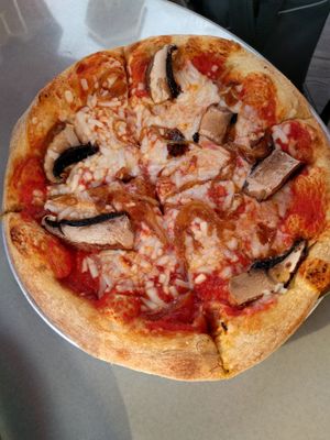 Pizza with vegan cheese, carmelized onions and portobello mushrooms at Mellow Mushroom in Gatlinburg