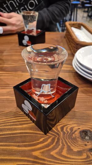 Sake in a wooden box at Pivot BASE Cafe & Bar ＠Dotonbori in Osaka
