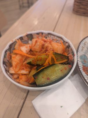The kimchi 3 type. I believe it was cabbage, daikon, and cucumber (with some julienned carrot) at Pivot BASE Cafe & Bar ＠Dotonbori in Osaka
