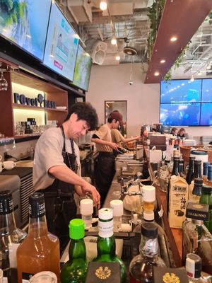 The enigmatic manager. at Pivot BASE Cafe & Bar ＠Dotonbori in Osaka