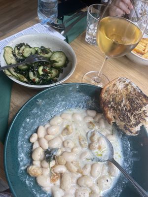 Korean cucumber salad, Butter Bean Main, glass of Riesling   at Chef & Co in Prague