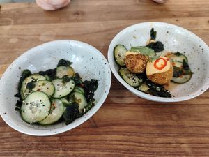 Cucumber salad and kimchi croquettes at Chef & Co in Prague
