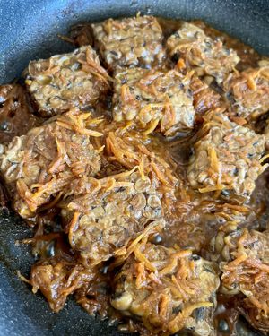 I marinate the cut tempeh, then fried, then stewed with soy sauce, grated carrots and coconut milk at Scoby Fermentary - Preorder Only in Yerevan
