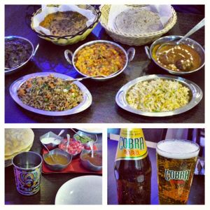 From left to right, back to frong: Methi Thepla, Fulka Rotli, Vegetable Harabhara, Dudhi Dal Nu Shaak, Malai Kofta, Vegetable Pilau Rice, Pilau Rice. at Sanskruti Restaurant in Manchester