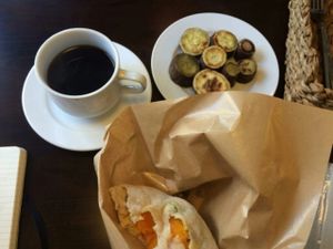 almost finished pita with airfried vegetables & fried sweet potato + coffee at Veggie Cafe in Kyoto