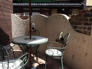 Outdoor seating at Veggie Cafe in Kyoto