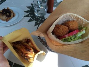 Vegan falafel in a pita with potato wedges at Veggie Cafe in Kyoto