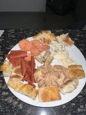 Plate I made using their vegan mortadella, salami and focaccia. The cheese is from Julietta’s pastry(Julietta’s is my favorite for cheese tbh but this place makes good stuff to at Fermaggio Bistrot & Store in Rome