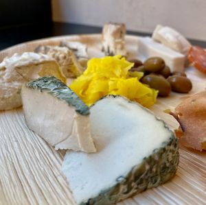 Cheese and cold cuts platter at Fermaggio Bistrot & Store in Rome