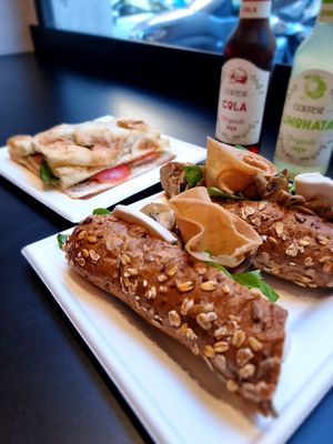 Sandwiches and drinks at Fermaggio Bistrot & Store in Rome