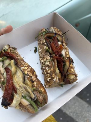 baguette with vegan mozzarella, eggplant, sun-dried tomatoes, and arugula  at Fermaggio Bistrot & Store in Rome