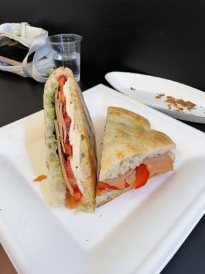 The Caprese stuffed pizza! Wow, best sandwich we’ve ever had!  at Fermaggio Bistrot & Store in Rome