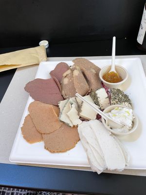 Meat and cheese platter! Beat vegan meat and cheese we’ve ever had!  at Fermaggio Bistrot & Store in Rome