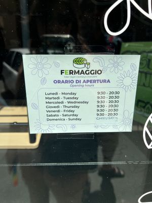 Paper over old hours on Sunday  at Fermaggio Bistrot & Store in Rome