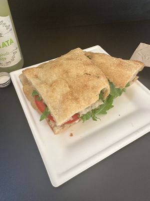 stracciatella stuffed pizza with extra tomato’s   at Fermaggio Bistrot & Store in Rome