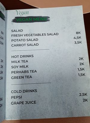 The menu in Mongolian and English at Loving Hut - Narnii Zam (Narnii/Sun Road) in Ulaanbaatar