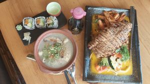 Vegan duck with curry. Mushroom soup and "salmon" sushi at Lucky Cat in Lueneburg