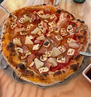 Hawaina pizza 😅 at Angolo Pizza Napolitana  in Mexico City