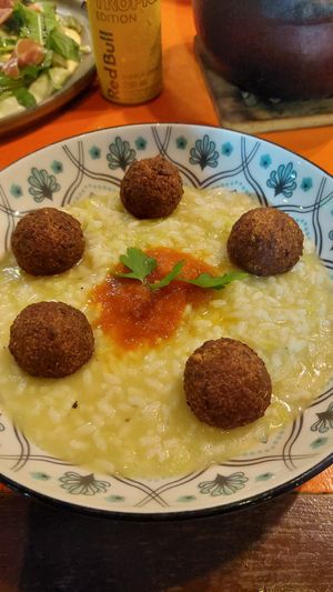 Risoto de alho-poró com almôndegas veganas at Xique-Xique Restaurante Itaúnas in Conceicao Da Barra