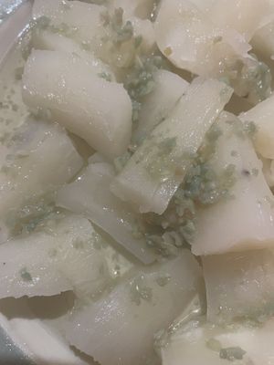 Yucca with fried garlic sauce  at Habanita in Sevilla