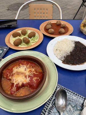 Croquettes, banana balls, black beans, stuffed peppers with vegan cheese  at Habanita in Sevilla