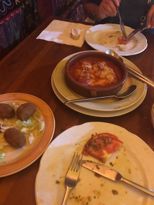 Vegan croquettes, stuffed peppers with vegan cheese and tomato and garlic salad at Habanita in Sevilla