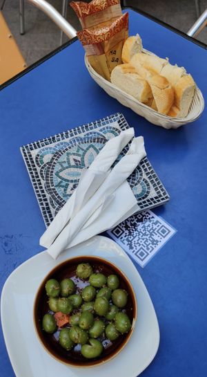 Olives, bread, and bread sticks. at Habanita in Sevilla
