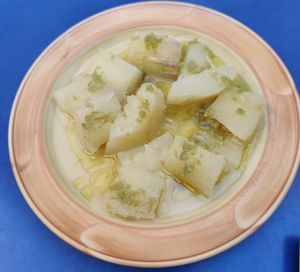 Yucca in garlic and oil. So tasty!! at Habanita in Sevilla