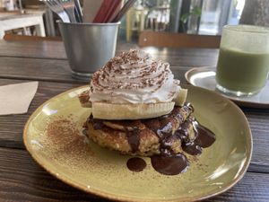 Pancakes with vegan chocolate sauce and whipped creamm  at Emilia Brunch & Cocktails in Guimaraes