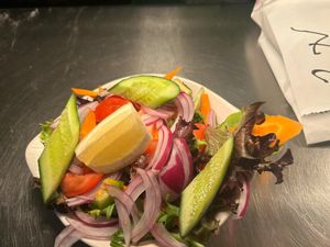 Fresh mixed greens, tomatoes, cucumber, onion & carrot tossed in a zesty lemon dressing. Crisp, vibrant, vegan-friendly — the perfect refreshing side for any meal. at Shavan's Pakenham in Pakenham