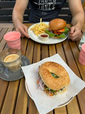 The Shack Burger with fries and Sa'mon cream cheese bagel at Velicious Café in North Narrabeen