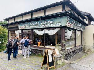 Their bathroom is outside, behind this place (left side😄)  at meguri coffee  in Nikko