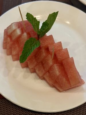 Free dessert, watermelon slices with mint!  at Kerala Palace Authentic Indian Restaurant in Nha Trang