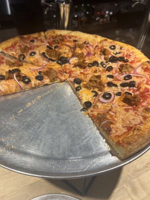 Vegan cheese, beyond sausage, red onion, black olives   at Gub Gub's in Walsenburg