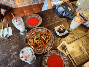 Mushroom pasta; iced rose coconut drink (highly recommend!!) at Xi Fusuba - 希府素吧 in Lijiang