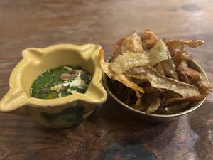 Potato skin and pesto aperitif   at Aioli Restaurant by Chris Finnigan in Birtley