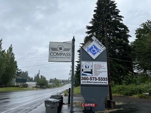 Look for this sign leading to the cafe  at Compass Coffee Roasting in Vancouver