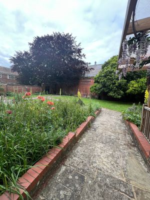 garden cared for by dementia community group in historic walled garden at Lenny's of Eastgate in Rochester